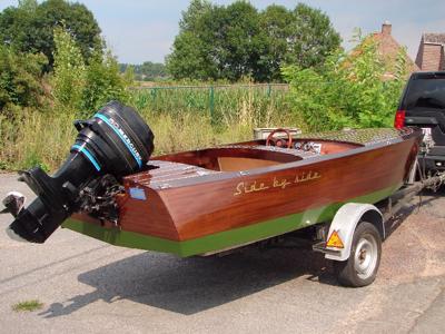 Side by side, a mahogany runabout