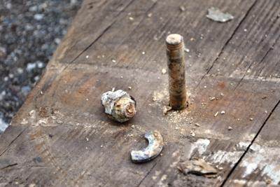 Corroded Brass Bolt in Stern Chine
