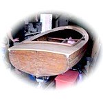 wooden sailing dinghy