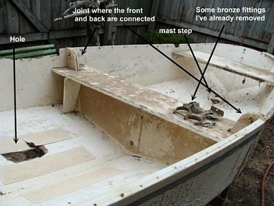 Small vintage wooden dinghy made in 2 parts.