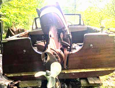 1958 Thompson Lapstrake Sea Coaster with the original 1958 Johnson Seahorse 35 hp engine, and original 1958 Mastercraft trailer.